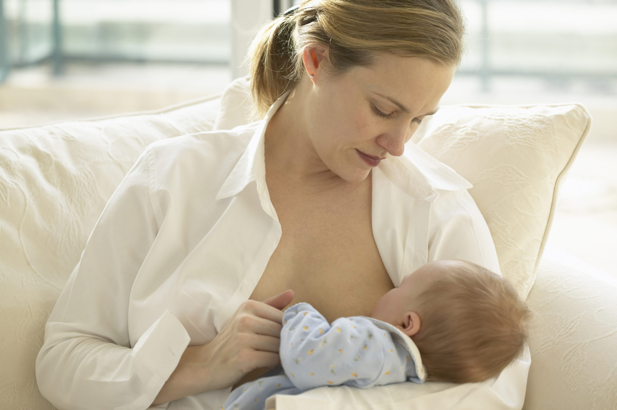 Mother Breast Feeding Newborn Baby