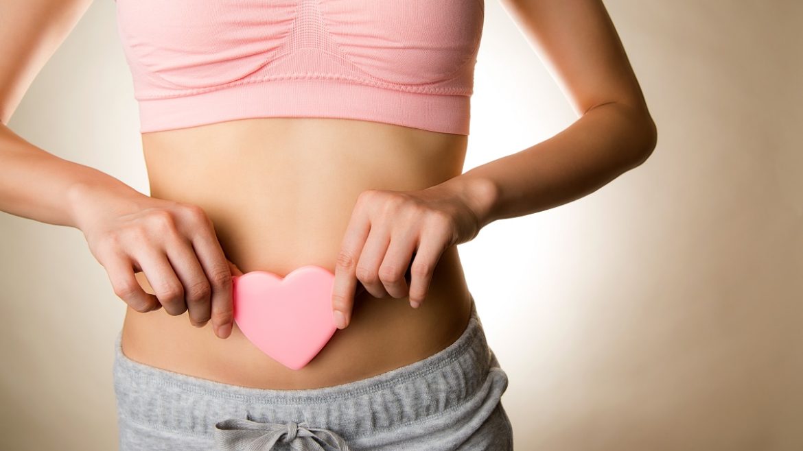 woman with heart over tummy